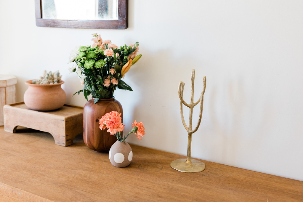 Flowers in a Vase on a Wooden Table